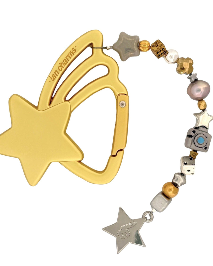 Gold engraved shooting star carabiner with camera, dice and gold beads and a silver star – the good as gold keychain