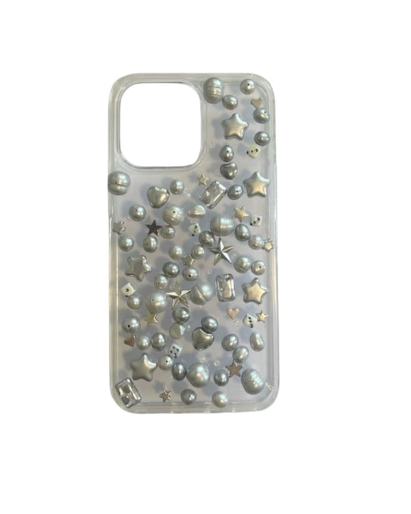 Clear iPhone case covered in silver beads, pearls and star charms – the hua phone case by Ian Charms