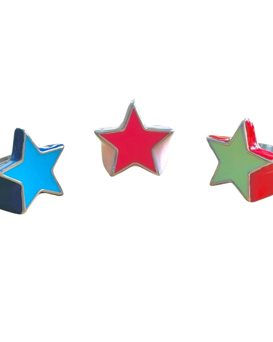Three enamel star rings in blue/bluer, pink/pinker and mint/red colorways – the stargays ring by Ian Charms