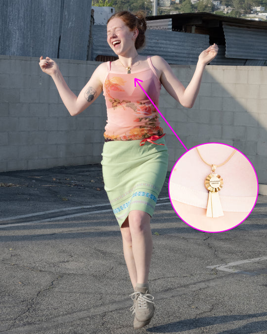 the made it out alive medal necklace