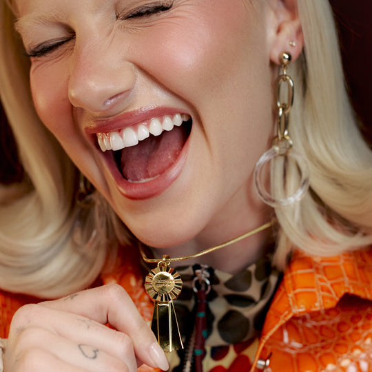 the made it out alive medal necklace