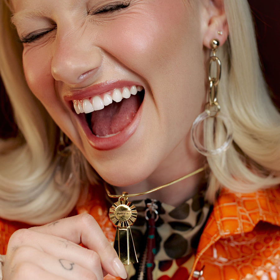 the made it out alive medal necklace
