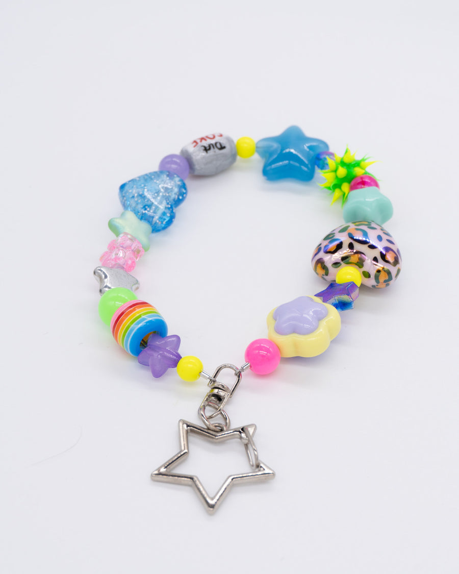 Phone charm with blue star, leopard heart, rainbow and pink beads on a star clasp – the firstborn phone charm