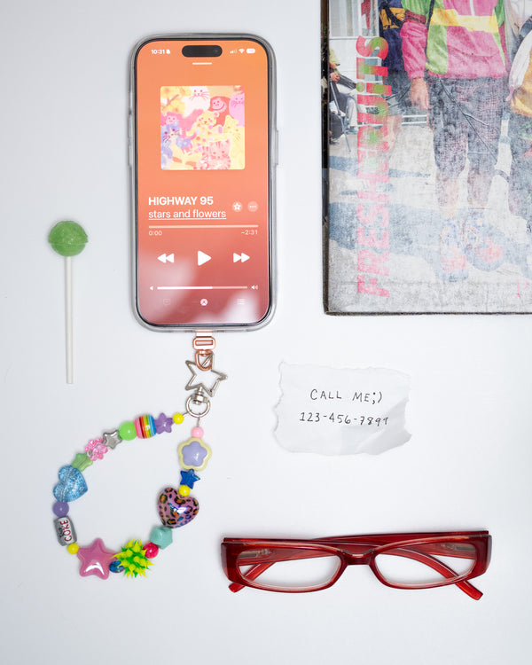 the firstborn phone charm