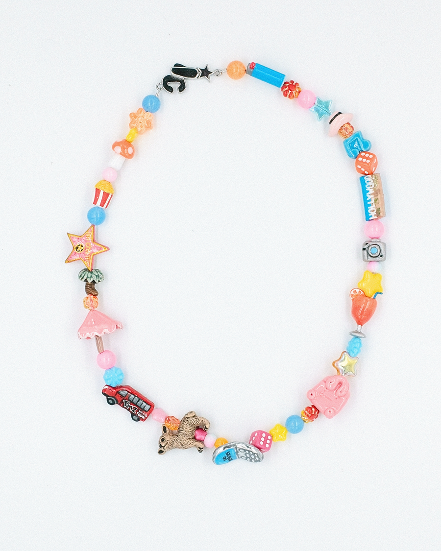 Colorful beaded necklace with hand-painted ceramic red bus, palm, star and heart beads – the la necklace by Ian Charms