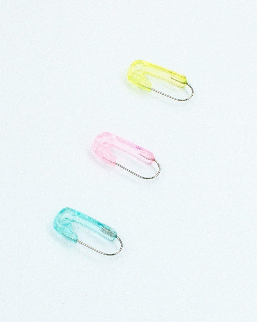 Three resin safety pin earrings in green, pink and blue – the safety second earrings by Ian Charms
