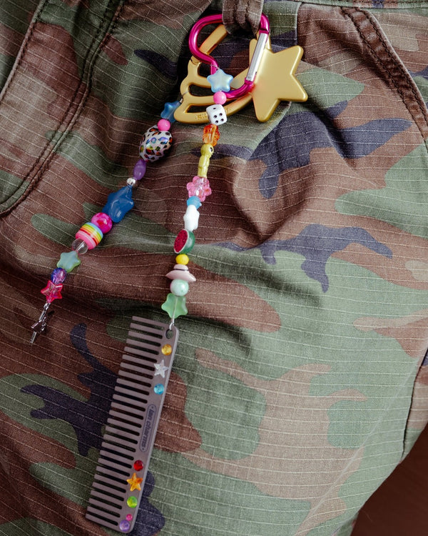 the mini slick hair comb keychain